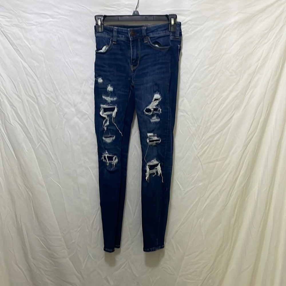 American eagle, next level stretch, holes with patches over them